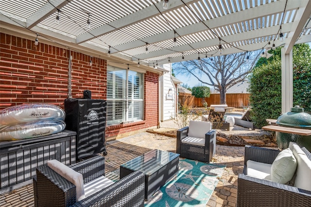 view of patio / terrace featuring fence, outdoor lounge area, and a pergola