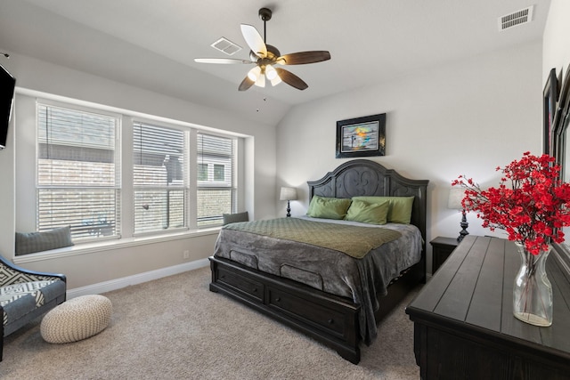 bedroom featuring vaulted ceiling, carpet, visible vents, and baseboards