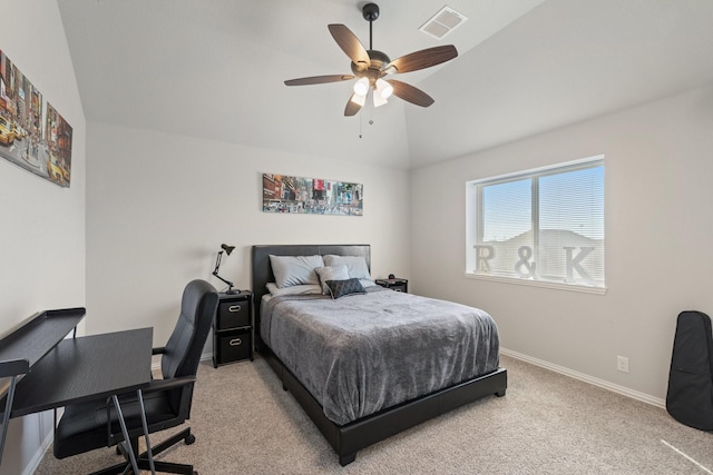 bedroom featuring light colored carpet, visible vents, vaulted ceiling, and baseboards