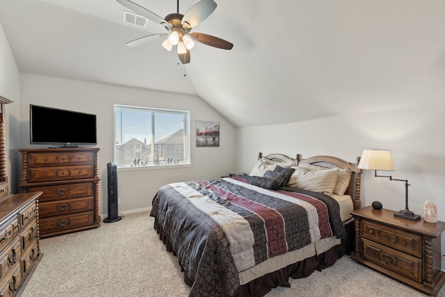 bedroom with light carpet, visible vents, baseboards, vaulted ceiling, and a ceiling fan