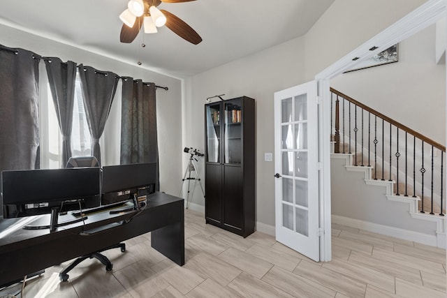 office with ceiling fan, baseboards, and french doors