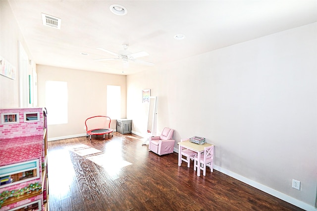 1500 Nugent St, Bowie, TX 76230 - game room with wood finished floors, baseboards, recessed lighting, and ceiling fan