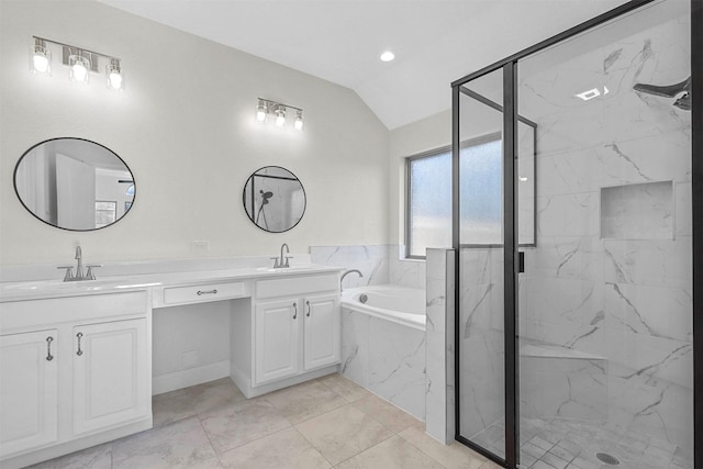 full bath featuring lofted ceiling, double vanity, a sink, and a marble finish shower