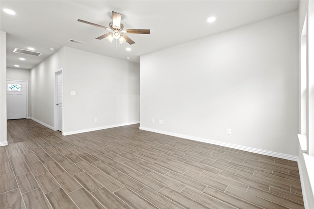 spare room featuring a ceiling fan, recessed lighting, and visible vents