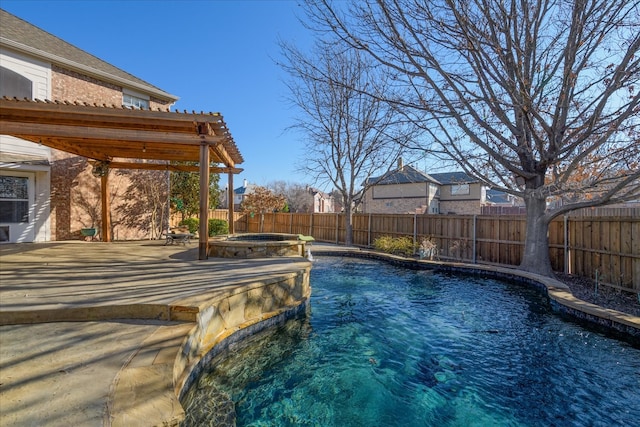 view of swimming pool featuring a fenced in pool, a fenced backyard, an in ground hot tub, and a patio area