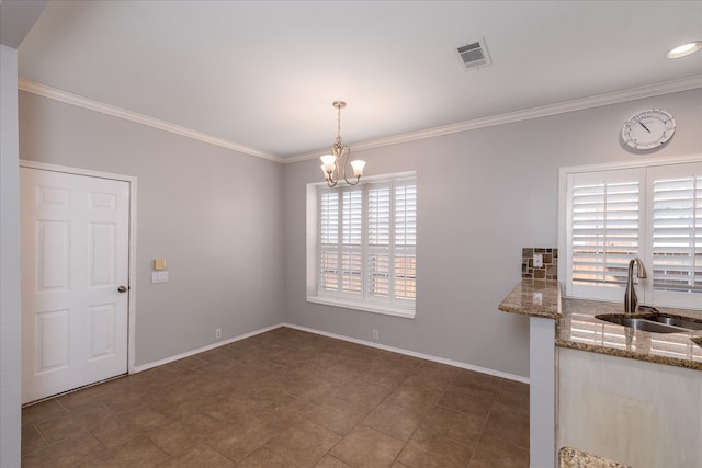 dining area featuring ornamental molding, visible vents, baseboards, and an inviting chandelier