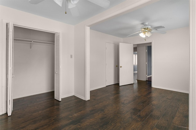 unfurnished bedroom with ceiling fan, baseboards, and wood finished floors