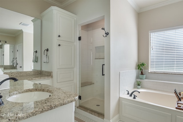 bathroom featuring a garden tub, visible vents, ornamental molding, a stall shower, and vanity