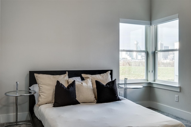 bedroom featuring baseboards