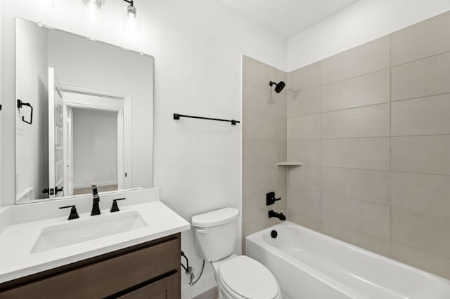 full bathroom with toilet, tub / shower combination, and vanity