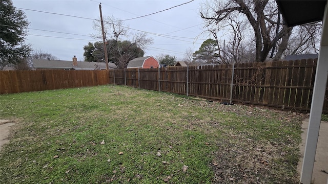 view of yard featuring a fenced backyard