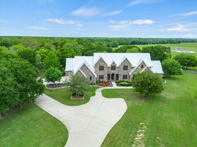 drone / aerial view with a view of trees