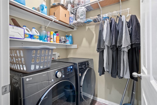 laundry area featuring laundry area and washer and clothes dryer