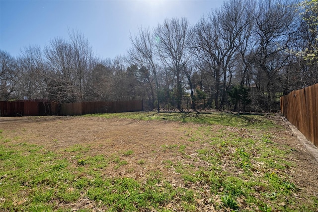 view of yard featuring fence