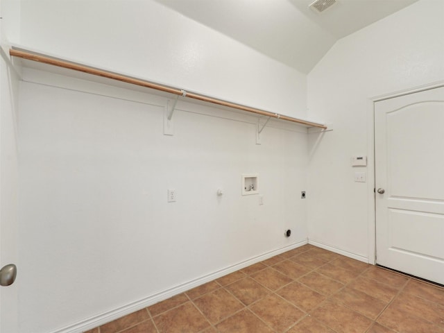 clothes washing area featuring laundry area, visible vents, gas dryer hookup, hookup for a washing machine, and hookup for an electric dryer