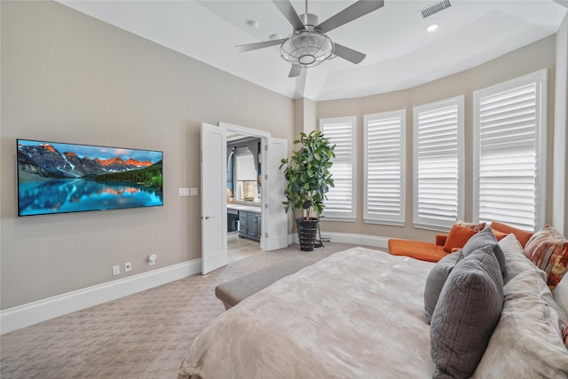 bedroom featuring light carpet, baseboards, visible vents, connected bathroom, and recessed lighting