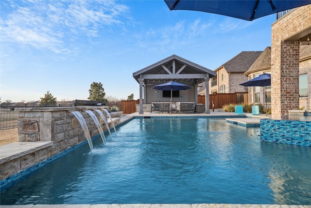 view of pool featuring a fenced in pool, fence, and a patio