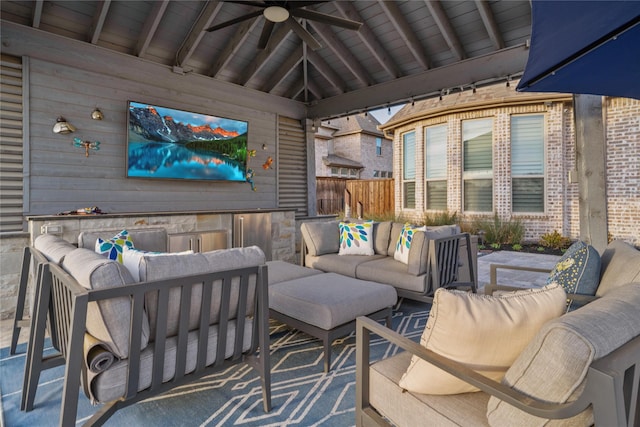 view of patio with ceiling fan, outdoor lounge area, and fence