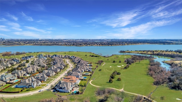 bird's eye view featuring a water view and a residential view