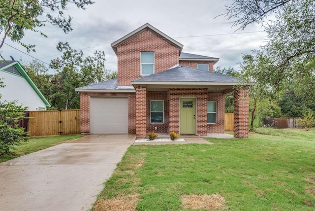 traditional-style home featuring a garage, brick siding, fence, concrete driveway, and a front lawn