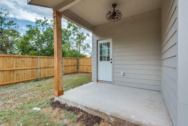 exterior space featuring fence and a patio