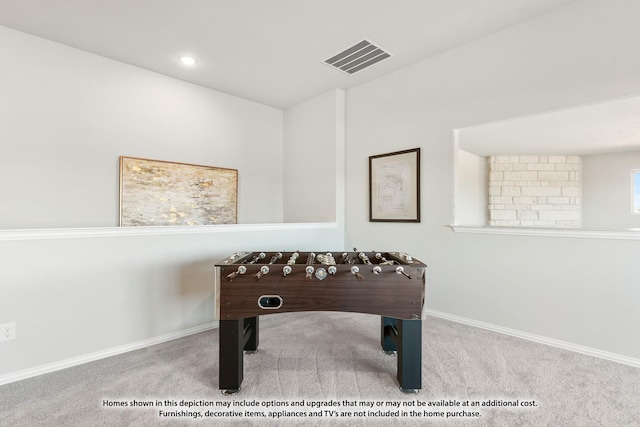 playroom featuring baseboards, visible vents, and carpet flooring