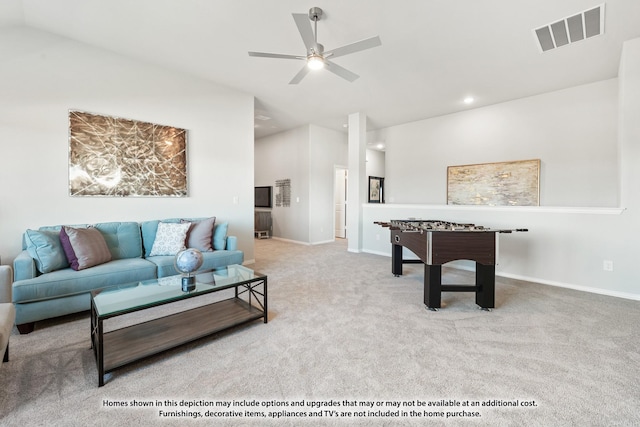 recreation room featuring carpet, visible vents, ceiling fan, and baseboards