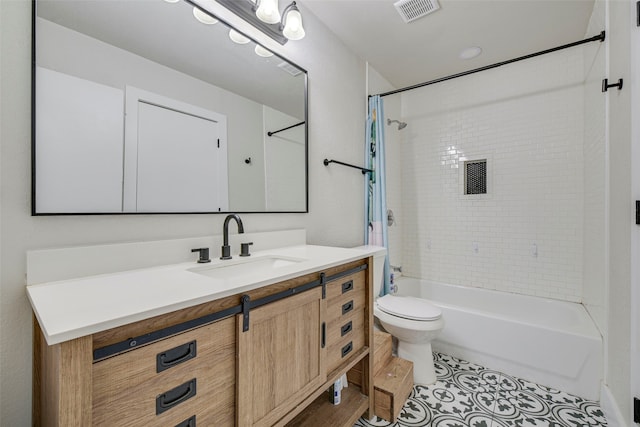 full bathroom featuring toilet, shower / tub combo, vanity, visible vents, and tile patterned floors