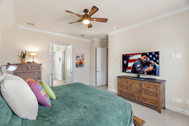 bedroom featuring ornamental molding, visible vents, light carpet, and baseboards