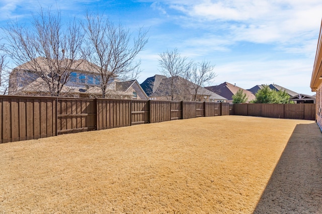 view of yard featuring a fenced backyard