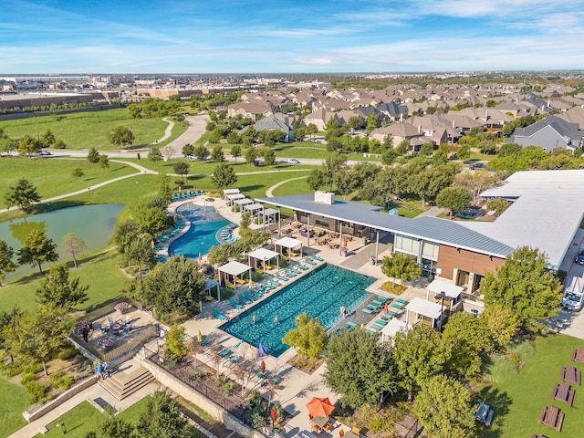 aerial view with a water view and a residential view