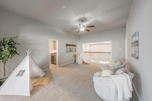 rec room featuring a ceiling fan, carpet flooring, visible vents, and baseboards