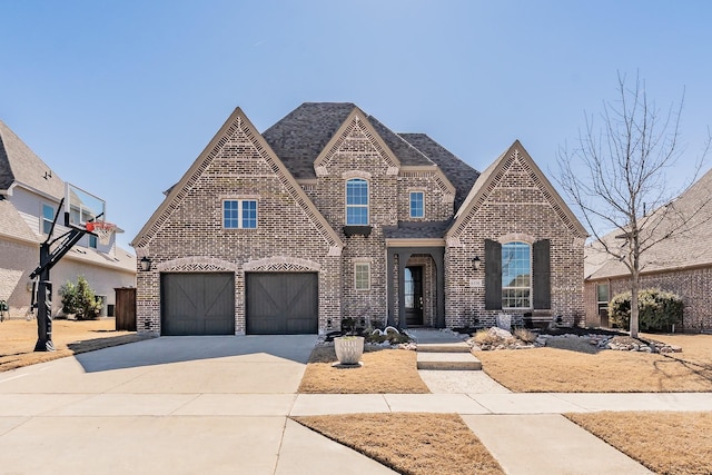 view of front of property featuring concrete driveway and brick siding