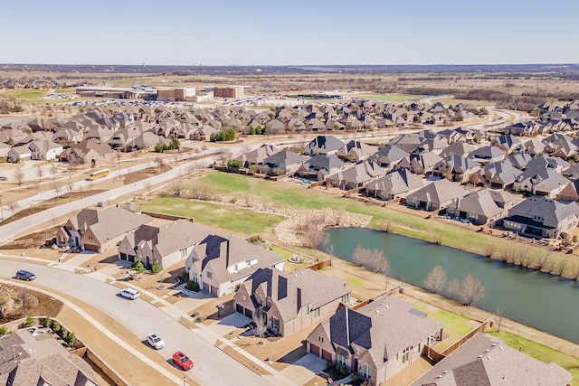 aerial view featuring a residential view and a water view