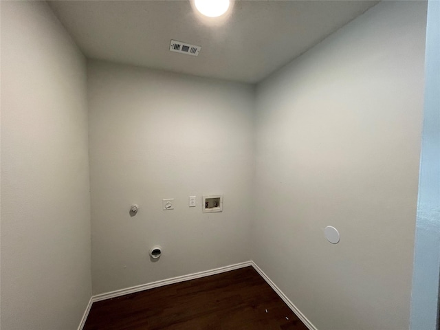 laundry room featuring laundry area, visible vents, hookup for a gas dryer, dark wood-type flooring, and washer hookup