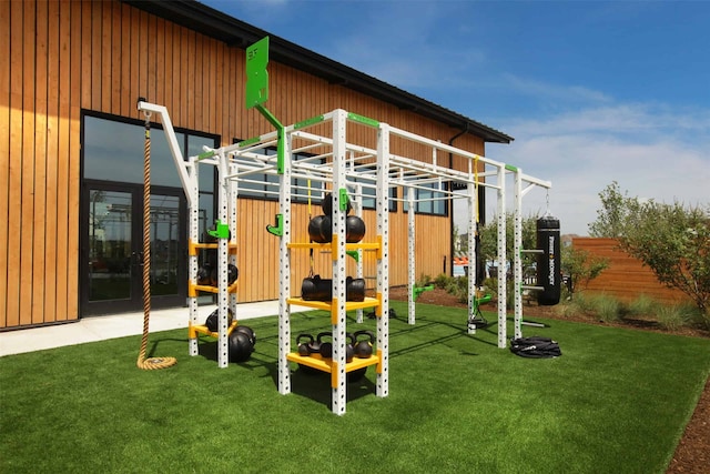 view of jungle gym featuring a yard