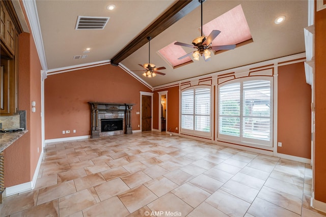 unfurnished living room with lofted ceiling with beams, a fireplace, visible vents, and baseboards