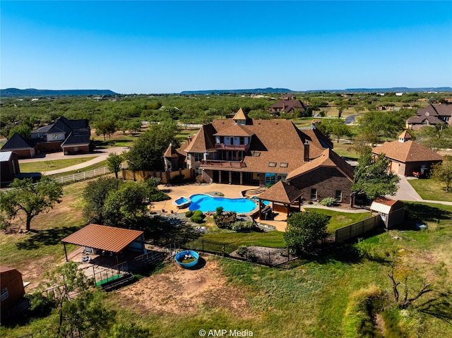 birds eye view of property featuring a residential view and a mountain view