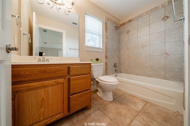 bathroom with visible vents, toilet,  shower combination, tile patterned flooring, and vanity