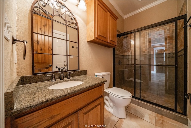 bathroom featuring a textured wall, toilet, ornamental molding, a stall shower, and vanity