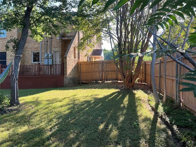 view of yard with a fenced backyard