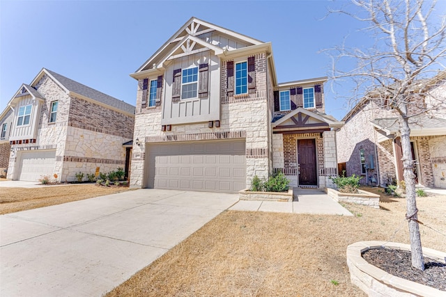 view of front of house featuring stone siding, concrete driveway, board and batten siding, and an attached garage