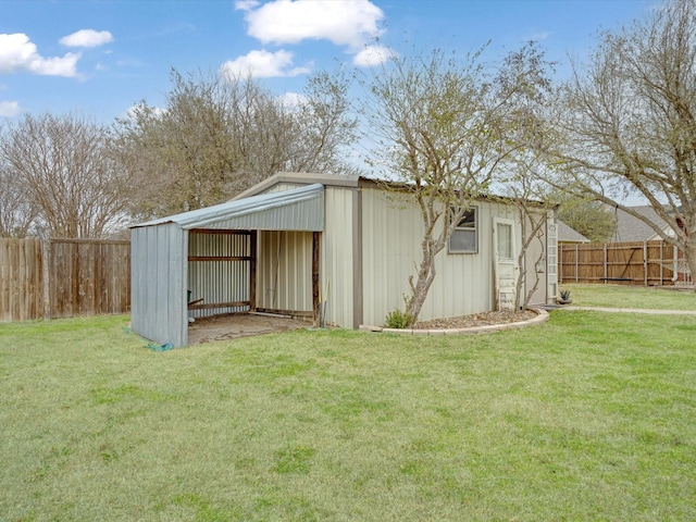 view of outbuilding featuring an outbuilding and a fenced backyard