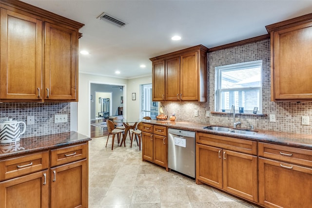 kitchen with dishwasher, visible vents, and brown cabinets