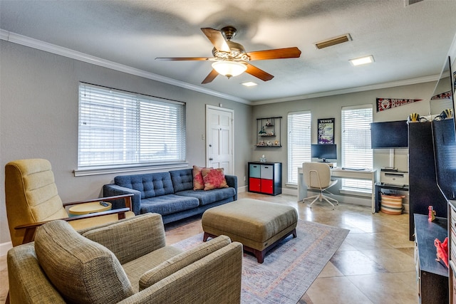 tiled living area featuring ceiling fan, a textured ceiling, visible vents, and crown molding