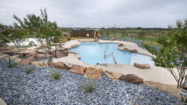 community pool featuring a patio