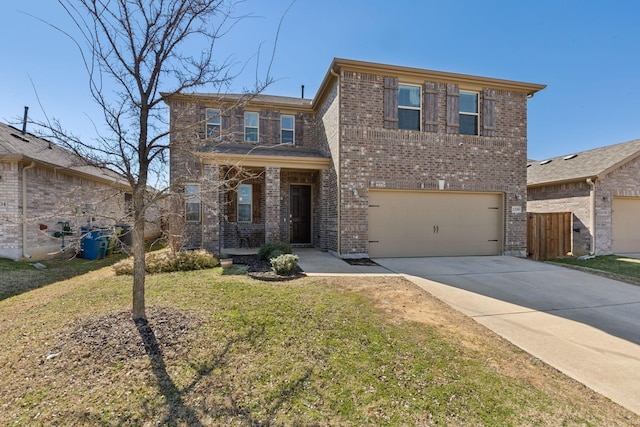 traditional home with a garage, brick siding, fence, driveway, and a front yard