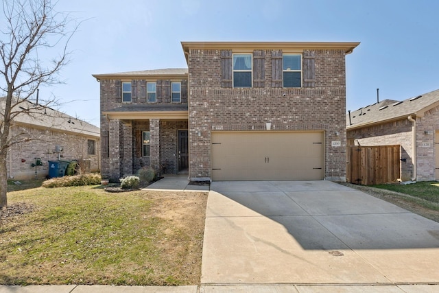 view of front of home featuring an attached garage, brick siding, fence, driveway, and a front lawn