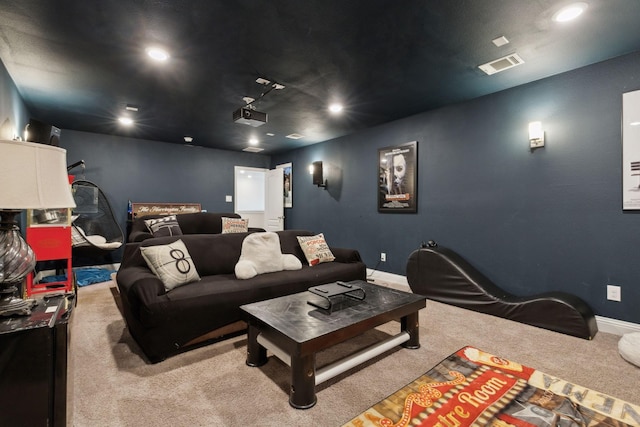 carpeted cinema with recessed lighting, visible vents, and baseboards