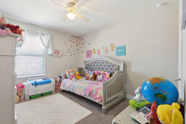 bedroom with carpet floors, a ceiling fan, and baseboards